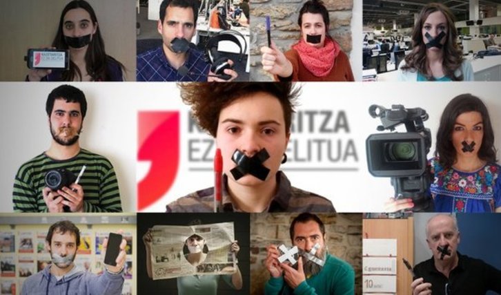 Des journalistes avec un bâillon sur la bouche pour dénoncer une entrave à la liberté de la presse. ©Kazetararitza ez da delitua.
