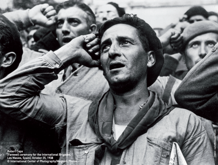 Robert Capa - farewell ceremony for the International Brigades, Les Masies, Spain. October 25, 1938. ©International Center of Photography/Magnum Photos